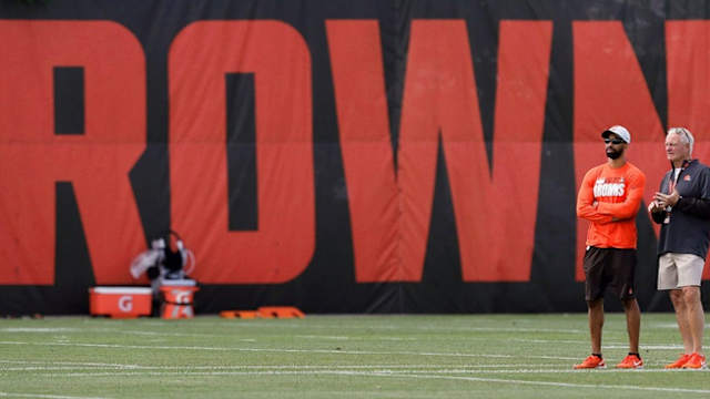 Cleveland Browns General Manager Andrew Berry, left, and owner Jimmy Haslam observe from the sideline during an NFL football practice at the team's training facility, Tuesday, June 15, 2021, in Berea, Ohio. Browns 8